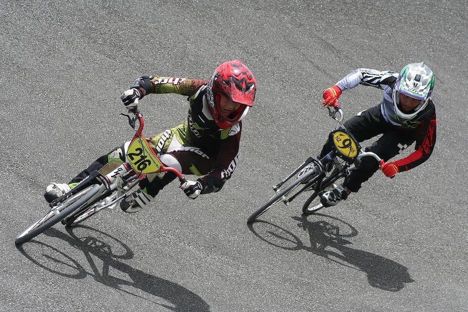 two racers on bikes competing